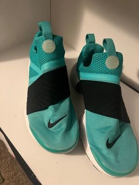 Women’s Nike Turquoise Slip-On Sneakers with Black Strap